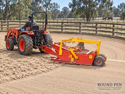 Compact tractor grooming a sandy round pen — application concept